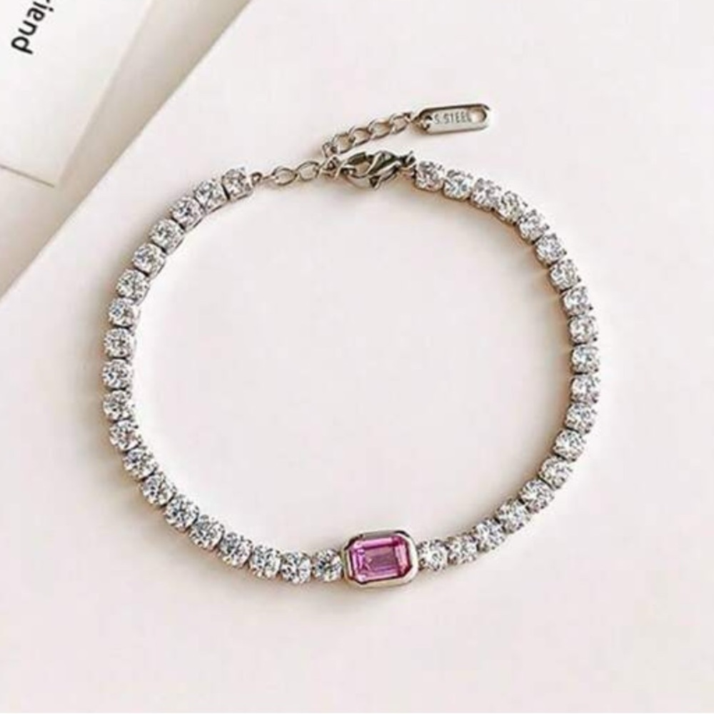 Stainless steel tennis bracelet with pink stone
